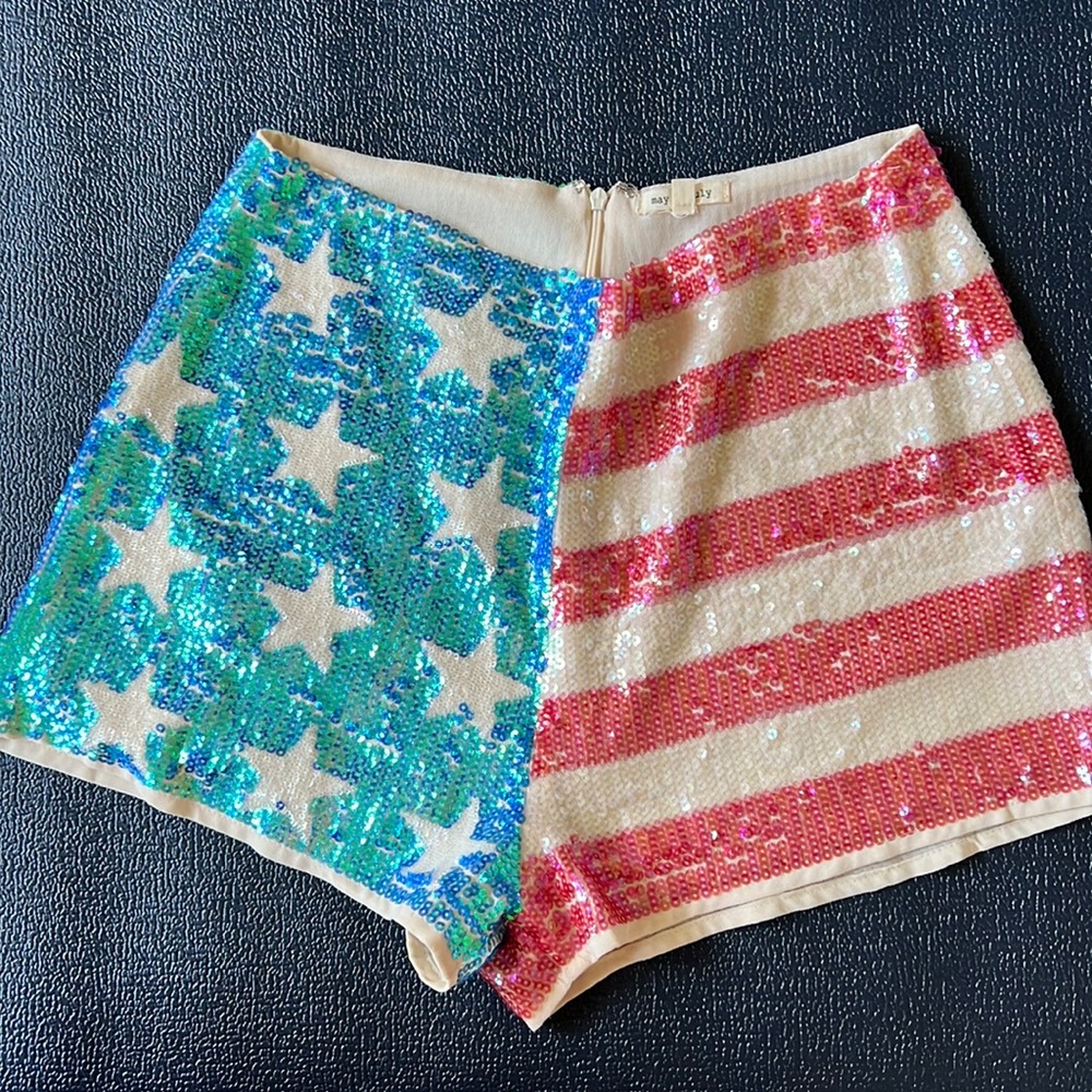 Sequin lined shorts stars and stripes great for Fourth of July size medium.
